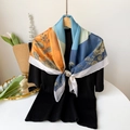 Vintage geometric floral silk scarf in orange and blue displayed on a wooden hanger - 90cm*90cm / Blue