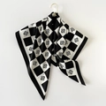 Detail of black and white checkerboard silk scarf with letter S print on gold hook - Black (W90273)