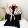 Elegant geometric print silk scarf displayed with accessories and white tulips - Large Square Scarf Style / Black Border (JLS90022)