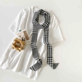 Close-up of classic black and white houndstooth skinny silk scarf on minimalist background - Houndstooth Print (P9005-Houndstooth)