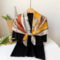 Detail of floral silk scarf with yellow and orange patterns on a wooden hanger - Jls90019-yellow / 90*90cm