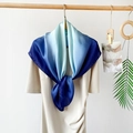 Blue gradient satin silk scarf tied on a beige dress in a stylish lifestyle setting - Blue Gradient
