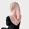 Detail showing the pleated texture and layered back view of a pink chiffon Muslim hijab - Lotus Pink