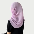 Detail of lavender pleated chiffon hijab showing the fine texture and accordion folds - Purple