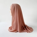 Detailed view of pink pleated chiffon hijab texture on a mannequin model - 170x70cm / Nude Pink