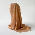 Detail showing vertical pleats on a dark camel chiffon hijab scarf for women - 170x70cm / Light Coffee