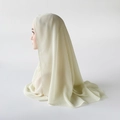 Detail of light beige pleated chiffon hijab with elegant wavy edge and high density texture - 170x70cm / Milk White