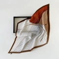 Detailed close-up showing the pleated texture and tri-color patchwork of the silk scarf - Plissé Pleated / Red Brown Magic