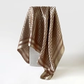 Detailed shot of champagne gold and brown silk scarf with Greek Meander pattern - Light Coffee
