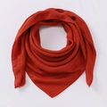 Detailed macro view of the rust red cotton linen scarf texture and neat edge craftsmanship - Crimson