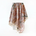 Detail of satin paisley scarf draped over a block showing silk luster and fine texture - 90x90cm / Yellow (D9444)