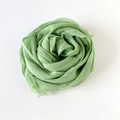 Close-up of grass green cotton linen scarf featuring pleated texture and fringed edges - 180*90CM / Light Emerald Green