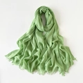 Detailed view of light green cotton linen scarf with soft pleated texture and fringe edges - 180*90CM / Light Emerald Green