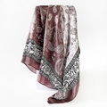 Detailed macro view of luxurious paisley print pattern on brown silk satin square scarf - 90x90cm / Light Burgundy (D9017)