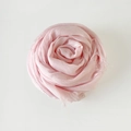 Light pink solid color linen scarf for women, folded into a decorative rose shape - Light Pink