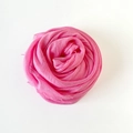 Solid light pink cotton linen scarf with frayed edges in a circular fold design - Pink