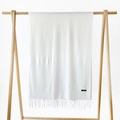 Elegant off-white cashmere scarf for women with soft tassels and minimalist wooden hanger - Milk White