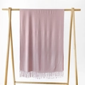 Solid dusty rose pink scarf with tassels hanging on a wooden hanger for women - Old Pink