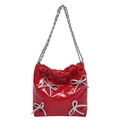 Quilted red bucket bag for women with silver bow details and chain strap - Red