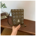 Olive green crossbody phone bag featuring silver grommets and metallic skull ornament - Skull Style / Green