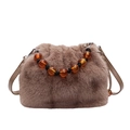 Brown faux mink fur bucket bag featuring amber resin bead handle and crossbody strap - Coffee