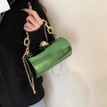 Metallic green cylindrical acrylic mirror clutch bag with pearl clasp and gold chain - Green