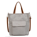 Light gray linen tote bag with brown leather handles and adjustable shoulder strap - Gray