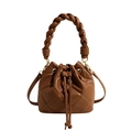 Quilted brown bucket bag with diamond lattice pattern and woven handle detail - Tan