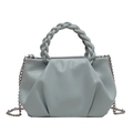 Light blue pleated crossbody bag with woven handle and elegant silver chain strap - Blue