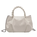 White ruched crossbody bag with a chunky woven handle and silver chain strap - White
