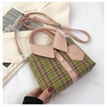 Macro detail of shirt-shaped green plaid handbag with pink leather trim and logo - Plaid Woolen (1133) / Pink