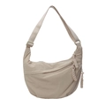 Minimalist beige nylon crescent crossbody bag with multi-pocket design and woven zipper - White