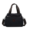 Bolso tote vintage de lona negra con correas marrones y múltiples compartimentos - Negro