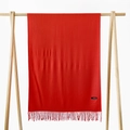 Detail of red cashmere scarf with fine tassels hanging on a wooden rack against white - 215*70cm / Bright Red (DW010-1)