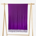 Detail view of solid dark purple cashmere scarf featuring soft texture and classic fringe edges - Violet / 215*70cm