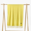 Detail of soft yellow cashmere scarf with elegant fringe trim and fabric composition label - Light Yellow / 215*70cm