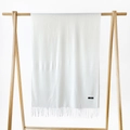 Detail of soft white cashmere scarf with fringe trim and material label on wooden hanger - Milk White / 215*70cm