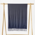 Detailed view of dark grey cashmere scarf with elegant tassels on a wooden hanger - Dark Gray / 215*70cm