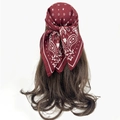 Detail of burgundy cashew flower scarf with star patterns on long brown wavy hair - Burgundy Paisley (RZ7069)