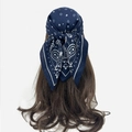 Navy blue paisley bandana styled as hair accessory on long wavy brunette hair - Dark Blue Paisley Star (RZ7069)