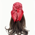 Close-up of red paisley pattern bandana tied on brown wavy hair in retro street style - Paisley Style (RZ6558) / Red (RZ6558-Red)