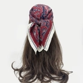 Detail of red and blue paisley bandana showing back tie styling on wavy hair - Dark Red Vintage Floral (RZ7064)