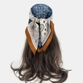 Close-up of navy and tan paisley silk scarf styled as a bohemian headband on a model - Navy Beige Patchwork (RZ6539)
