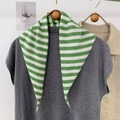 Detail showing green and white striped knit triangle scarf paired with a grey knit top - 95*33cm / Green (ZJP035)