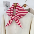 Detailed close-up of pink and beige striped knit triangle scarf on a beige cardigan - 95*33cm / Pink (ZJP035)