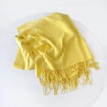 Solid bright yellow cashmere-like scarf with fringe details laid on white platform - 215*70cm / Chick Yellow (DW010-21)