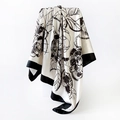 Elegant 90cm satin square scarf featuring black camellia print and sleek black borders - Off-white