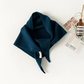 Detailed knit texture of 100% pure wool triangular scarf in deep teal green color - Dark Blue