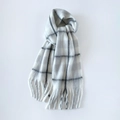 Chic mohair plaid scarf featuring a classic white and grey grid pattern with long tassels - Gray