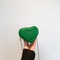 Green heart-shaped mini crossbody bag with silver chain strap and FASHION & RYX logo - Green